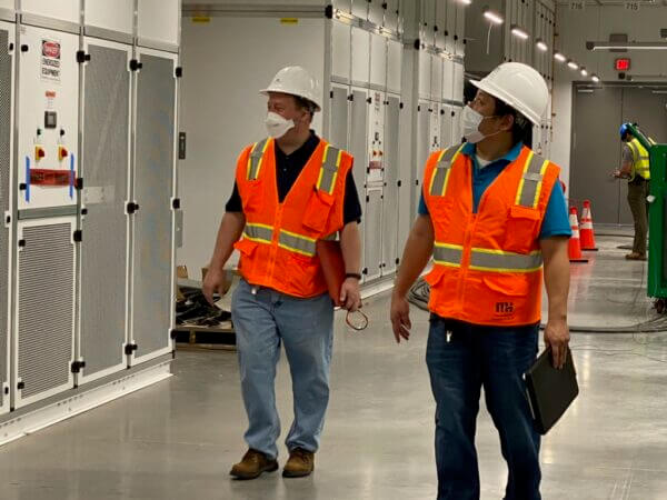 Mechanical Engineers walking in the Data Center