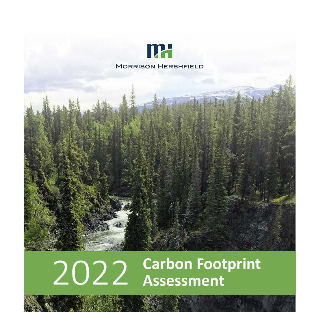 Forest area with text that states "2022 Carbon Footprint Assessment"